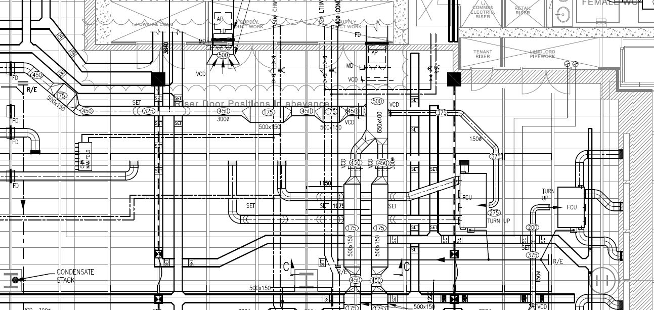 Excerpt from a detailed HVAC coordinated working drawing showing ducts, services, annotations and building-plan geometry.